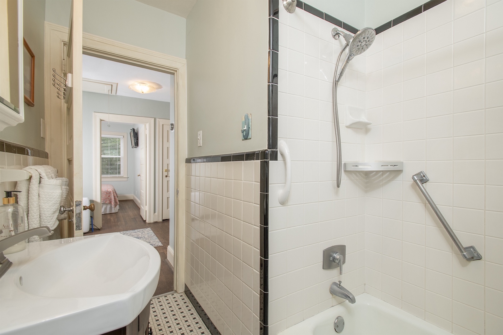 Charming Bathroom with Shower & Tub