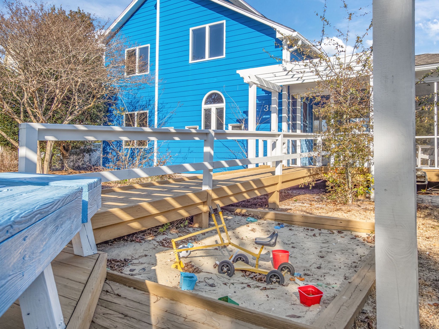 Watch your little ones build sandcastles and explore safely in this dedicated sandbox beneath the sunny deck.