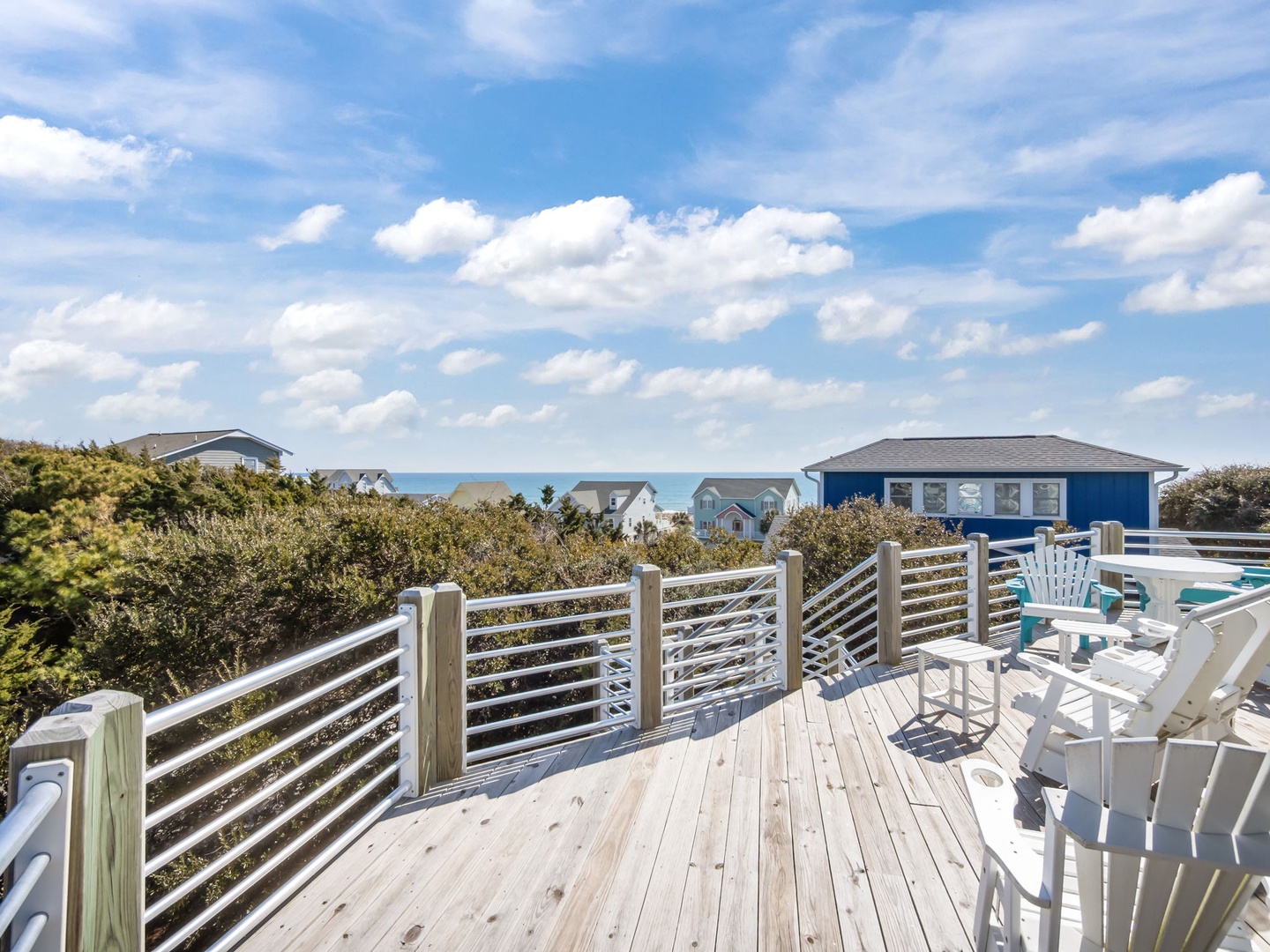 Relax on your private deck with stunning ocean views, where morning coffee and evening sunsets become daily rituals in this peaceful coastal retreat.