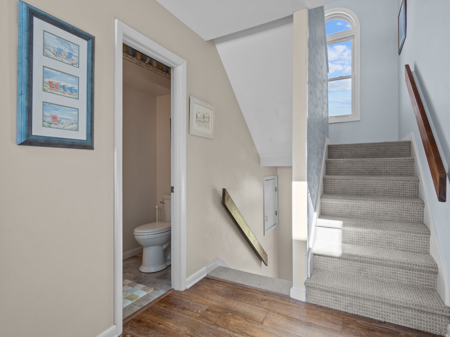 Stairs down to carport or up to the King Suite Loft