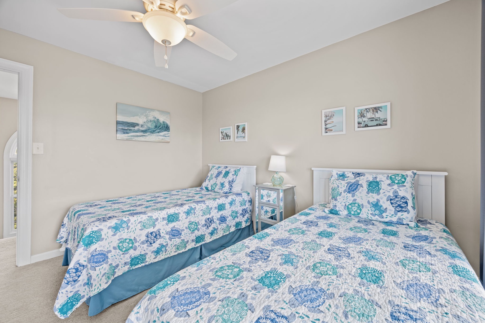 Drift off in this peaceful twin bedroom where coastal blues and soft whites create your perfect seaside retreat.
