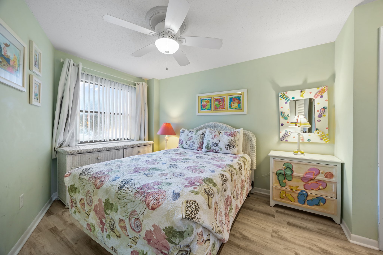 Your cozy bedroom features a sea-life themed bed and cheerful decor, creating the perfect coastal retreat for restful nights.