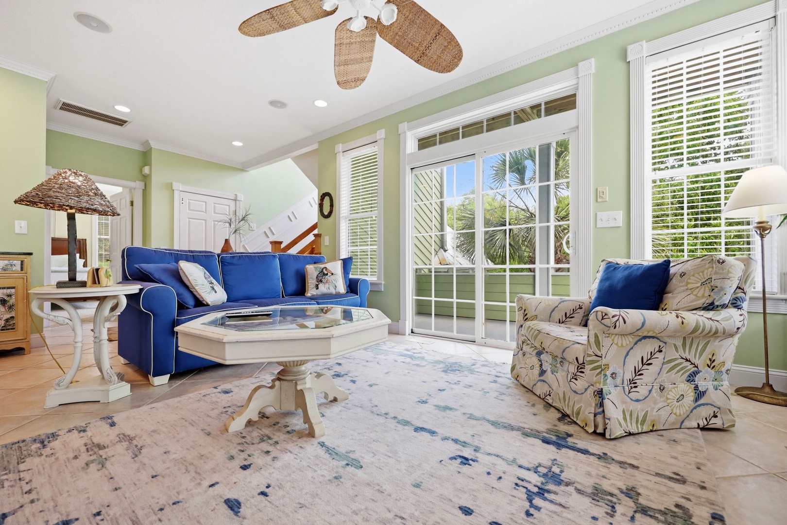 Relax into island-inspired comfort where coastal breezes and sunshine fill your living space. Plush seating invites unwinding after exploring, while tropical views frame your peaceful retreat.
