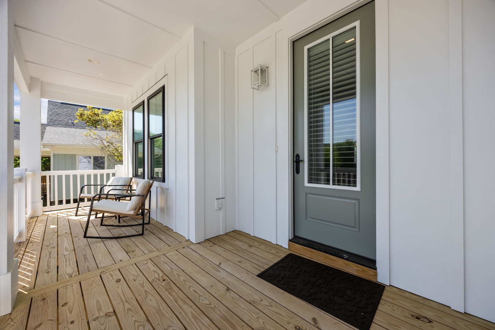 Step onto your private covered porch and sink into the cozy chair where you can unwind with morning coffee or evening relaxation.