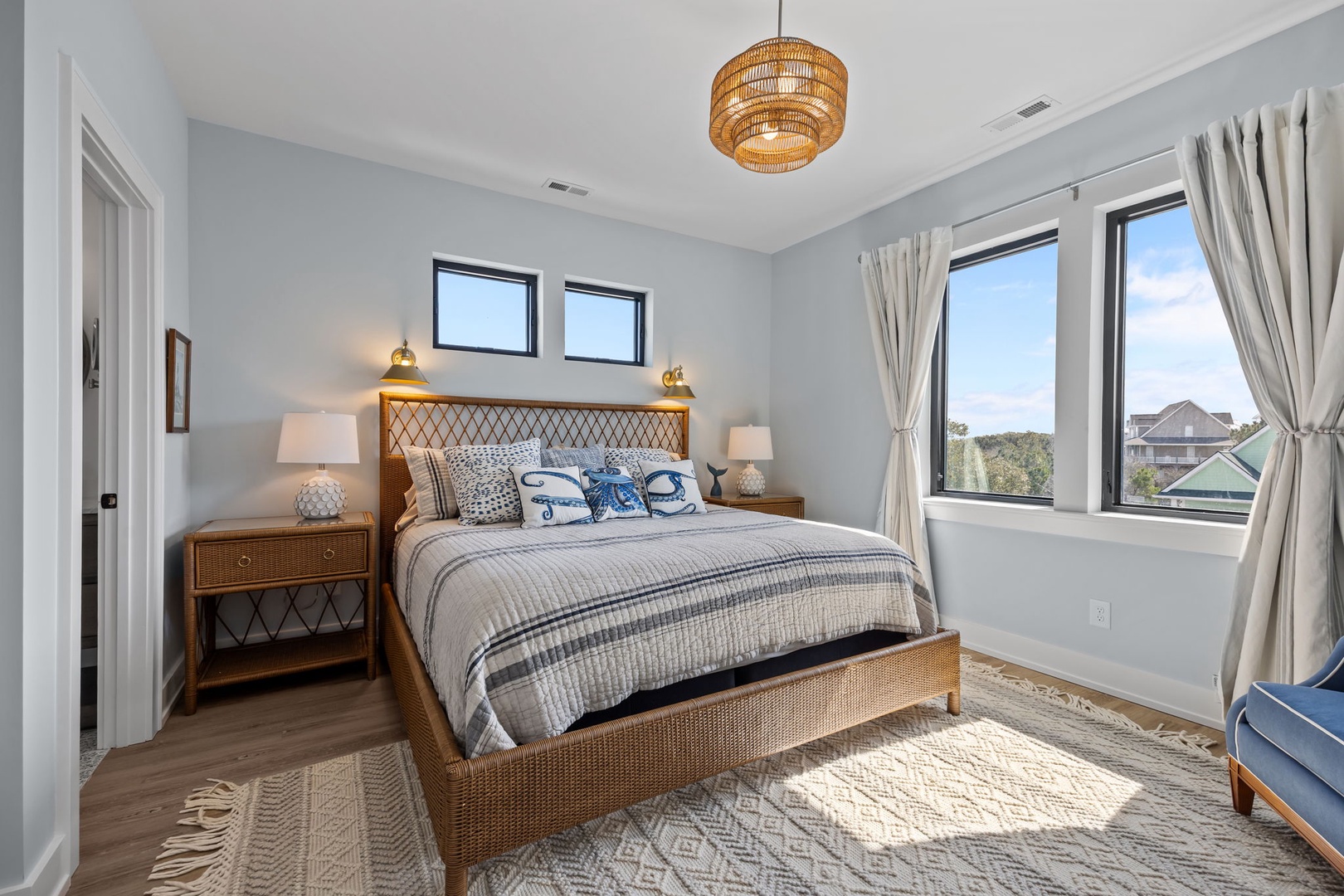 Drift to sleep in your peaceful retreat with natural textures, soft linens, and serene views framing your restful escape.