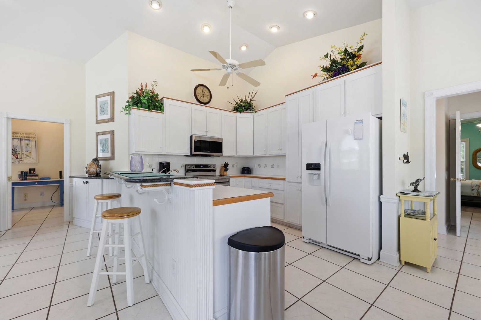 Picture yourself preparing meals in this bright, fully-equipped kitchen with an island—perfect for morning coffee or gathering with your group to plan the day's adventures.