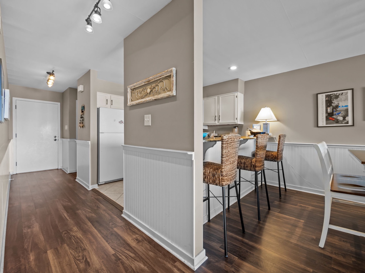 Your open-plan kitchen flows seamlessly into the dining area, perfect for morning coffee or evening meals with friends.