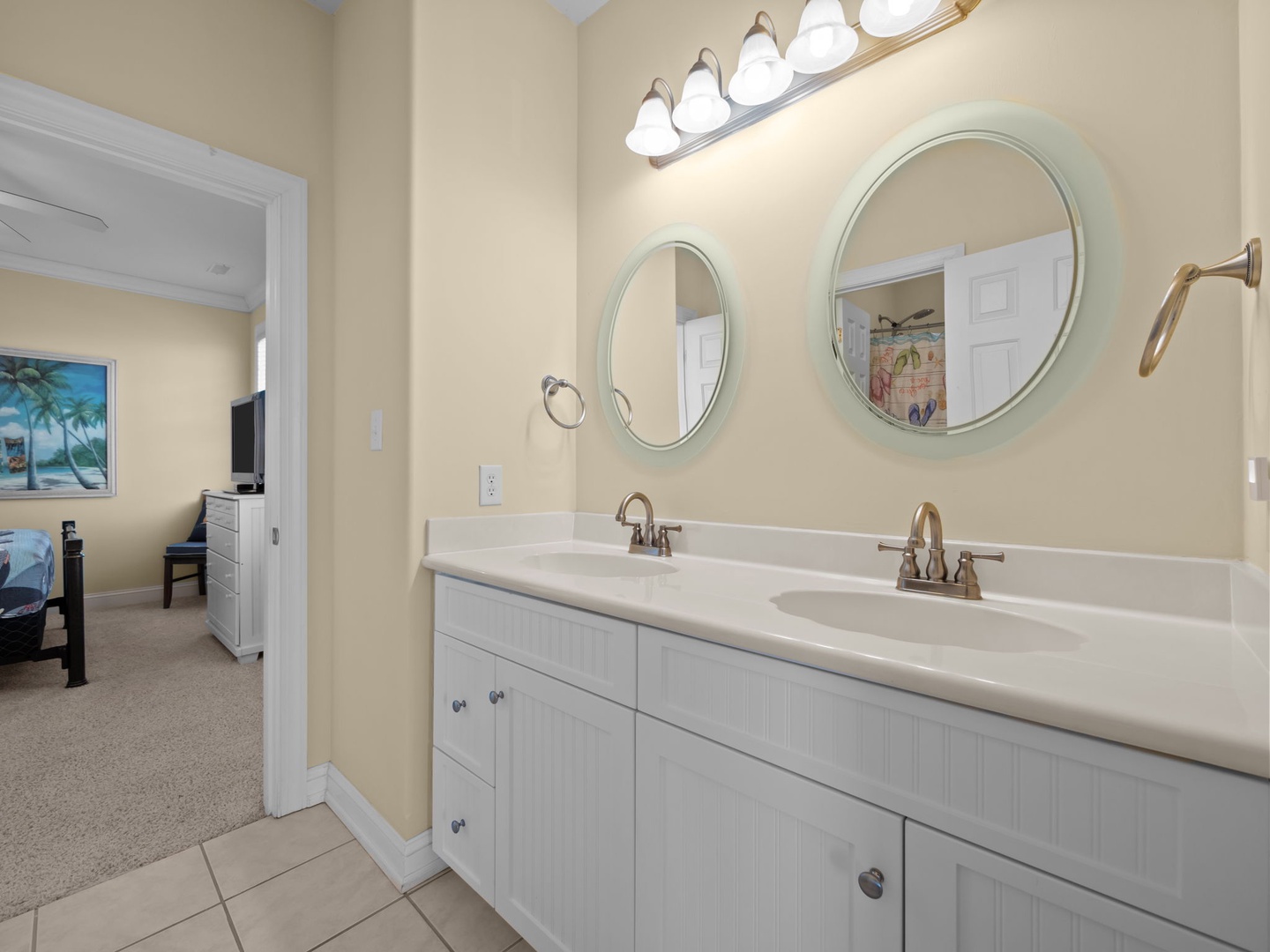 Your spacious double-vanity bathroom offers plenty of room to get ready, with bright lighting and clean lines for a refreshing start to your day.