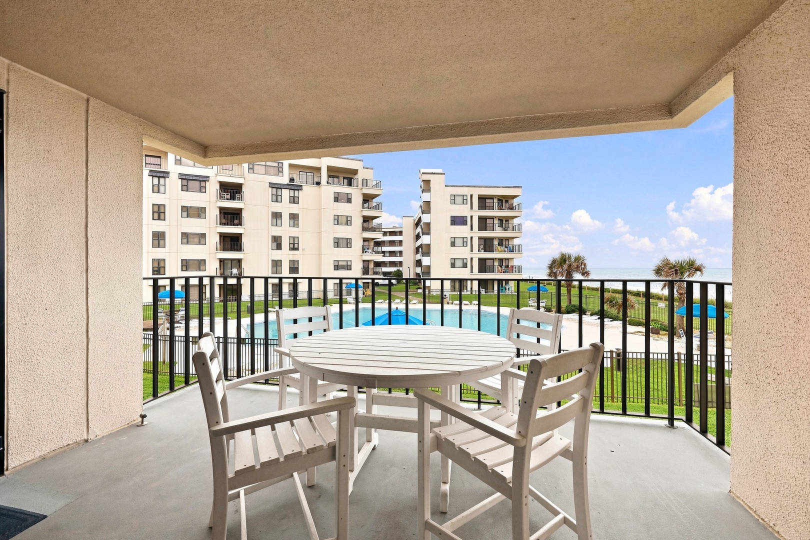 Summer Winds B-233 | Furnished Balcony with Pool and Ocean Views