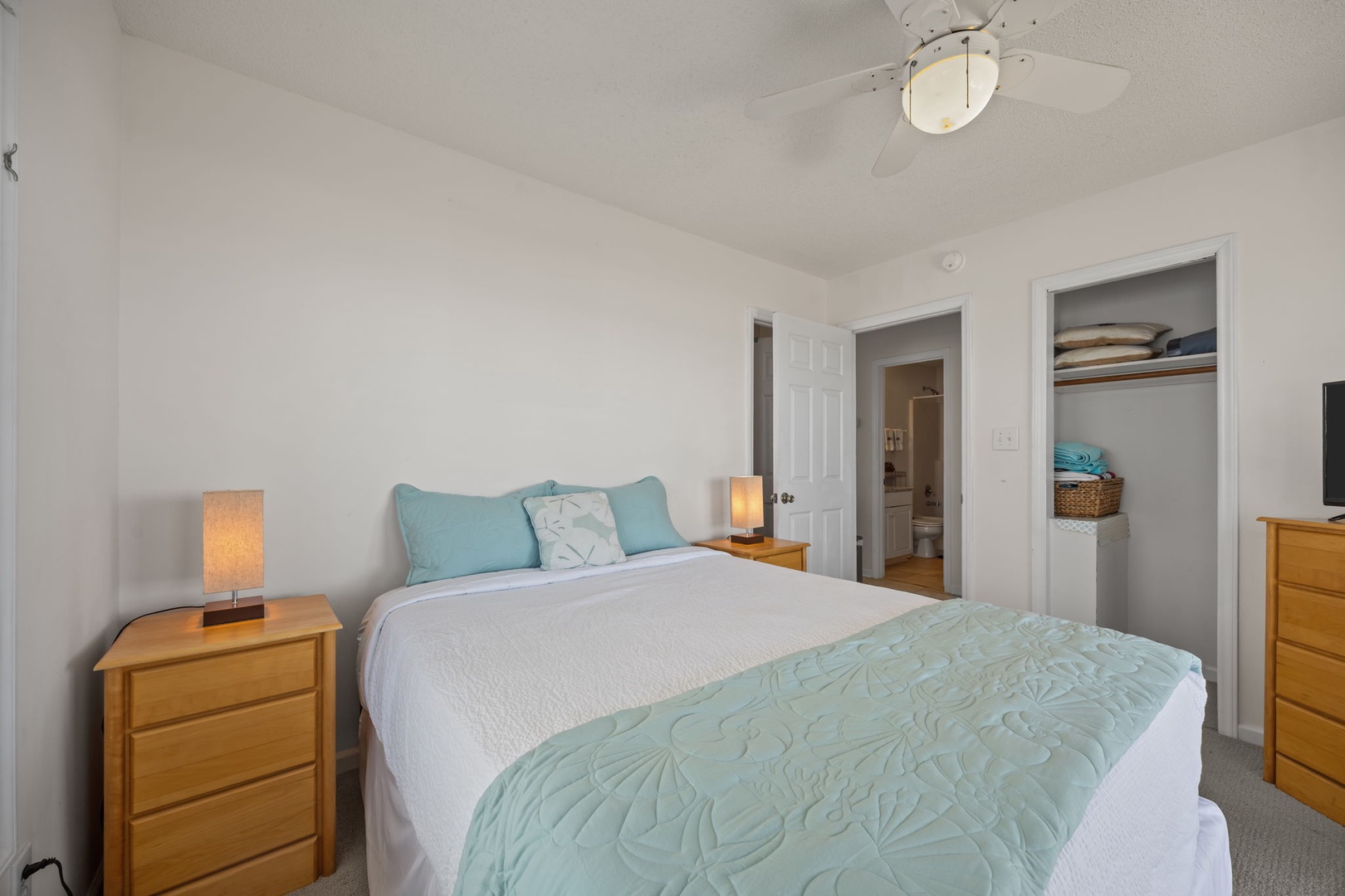 Rest peacefully in your serene bedroom with soft linens, gentle lighting, and an en-suite bathroom for your convenience.