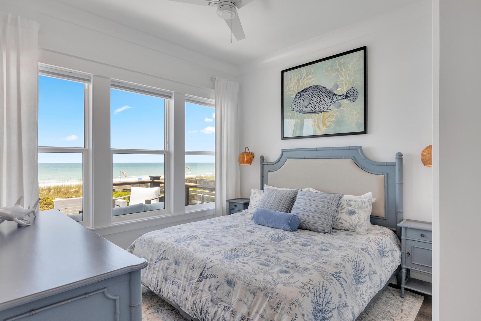 Wake up to breathtaking beachfront views from your serene bedroom, where soft coastal tones and gentle ocean breezes create the perfect retreat after a day by the water.