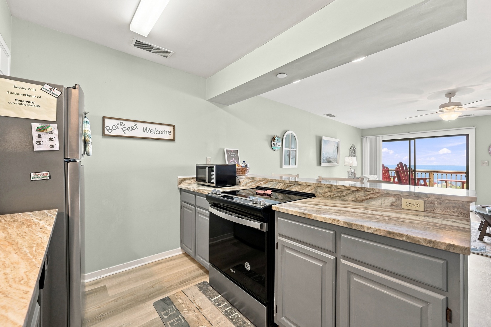 Char’s Cozy Condo | Kitchen and Living Area