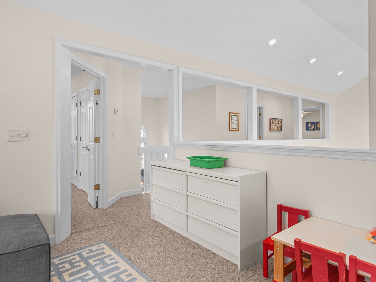 Your family-friendly loft space features plenty of storage and a dedicated kids' area with table and chairs for creative play and activities.