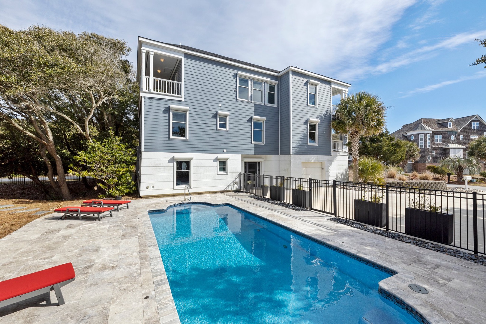 Side pool view of the house