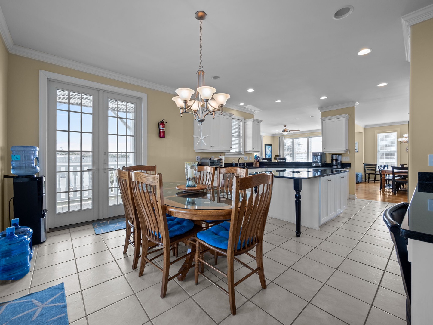Your open-concept kitchen and dining space features modern appliances and a welcoming table where you can enjoy meals together.