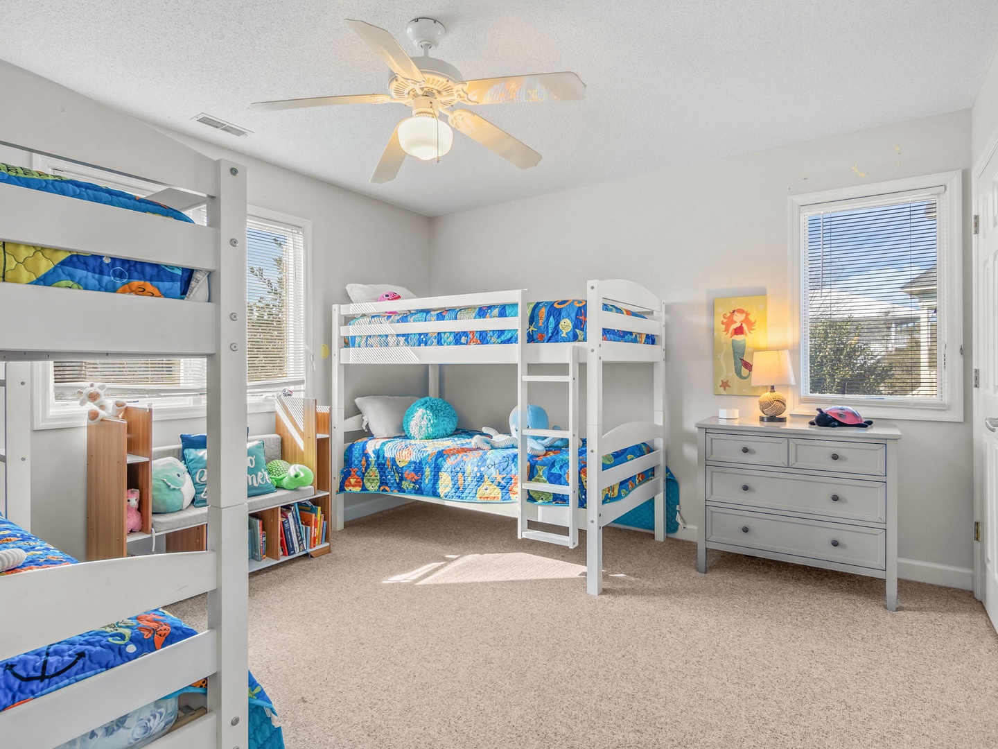 Your little adventurers will love this bright bedroom with two sets of bunk beds, perfect for family stays and creating magical childhood memories together.