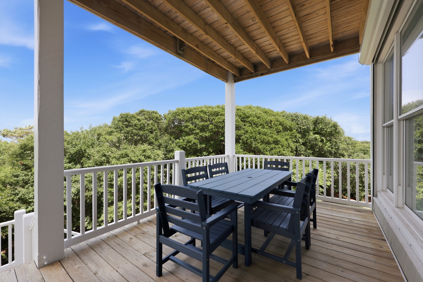 Blue Chair Stays | Outdoor Dining Area