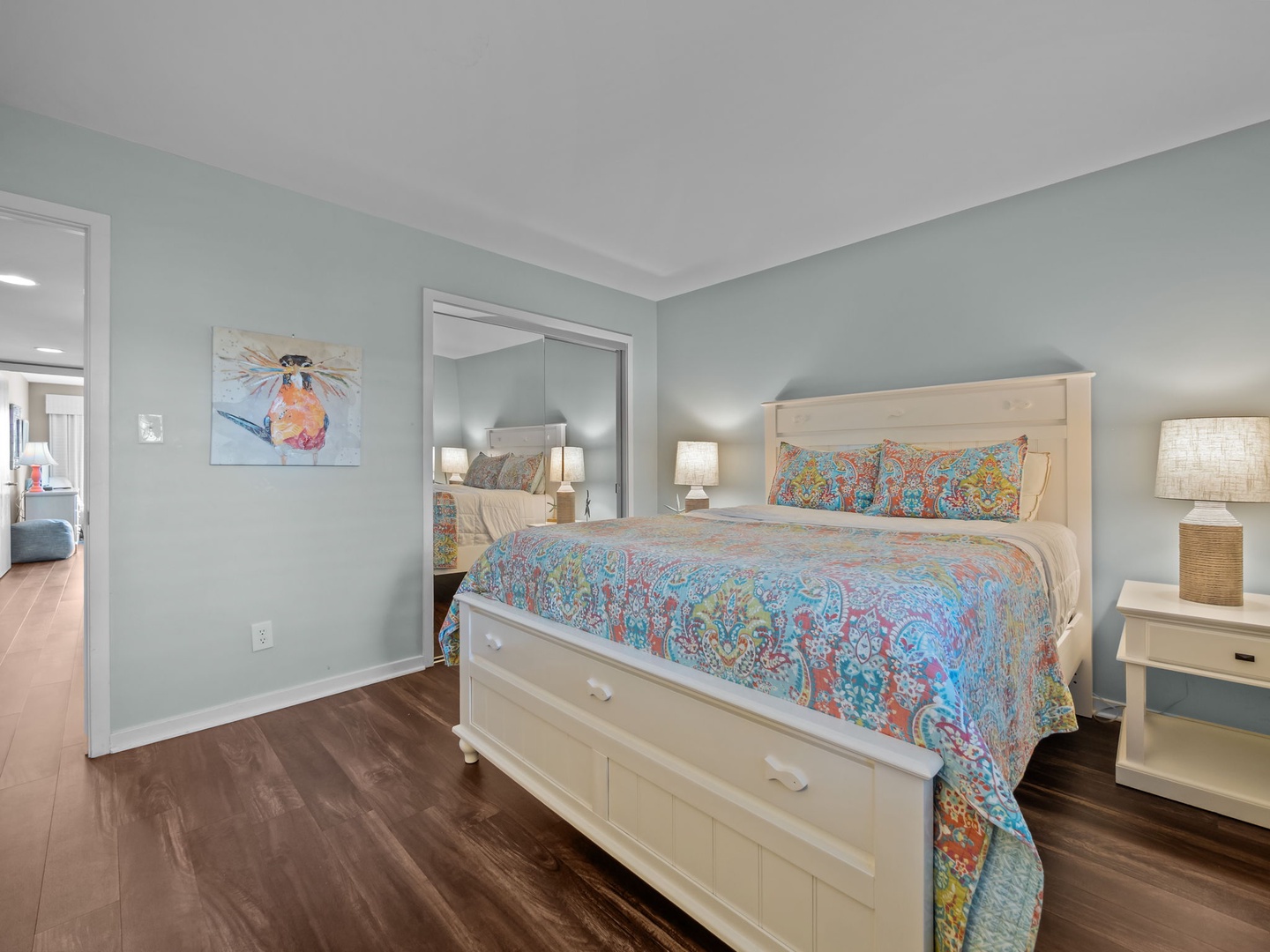 Sink into your comfortable bed surrounded by calming coastal colors and tropical artwork that sets the perfect beach vacation mood.