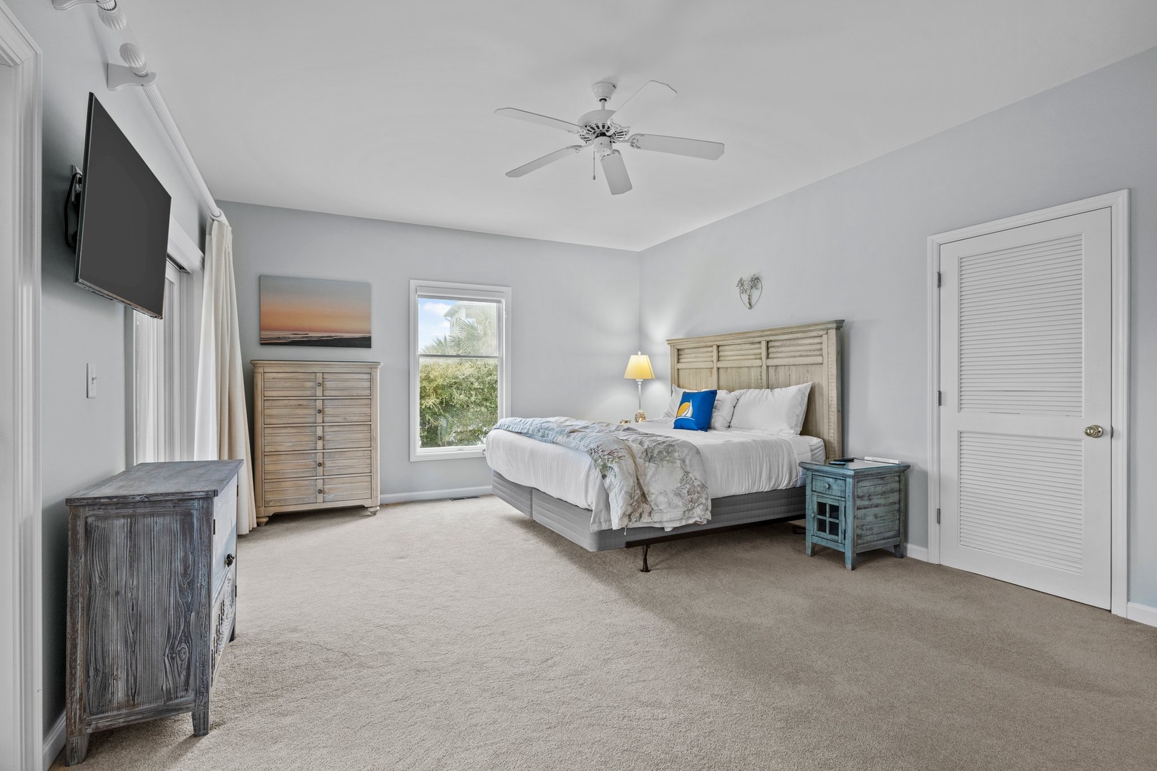 Master bedroom with a king bed