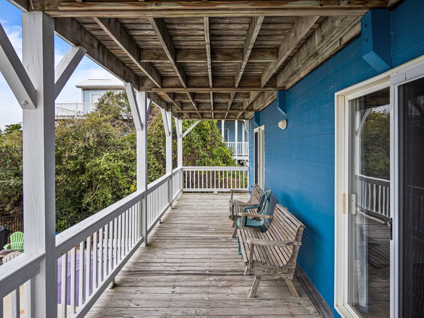 Settle into your covered deck with morning coffee, watching the world wake up through the trees.