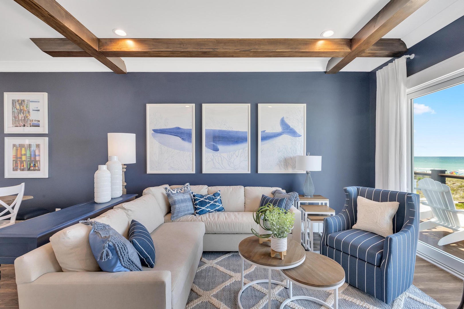 Sink into plush seating under coastal-inspired art and exposed beams, with refreshing ocean breezes just beyond your window.