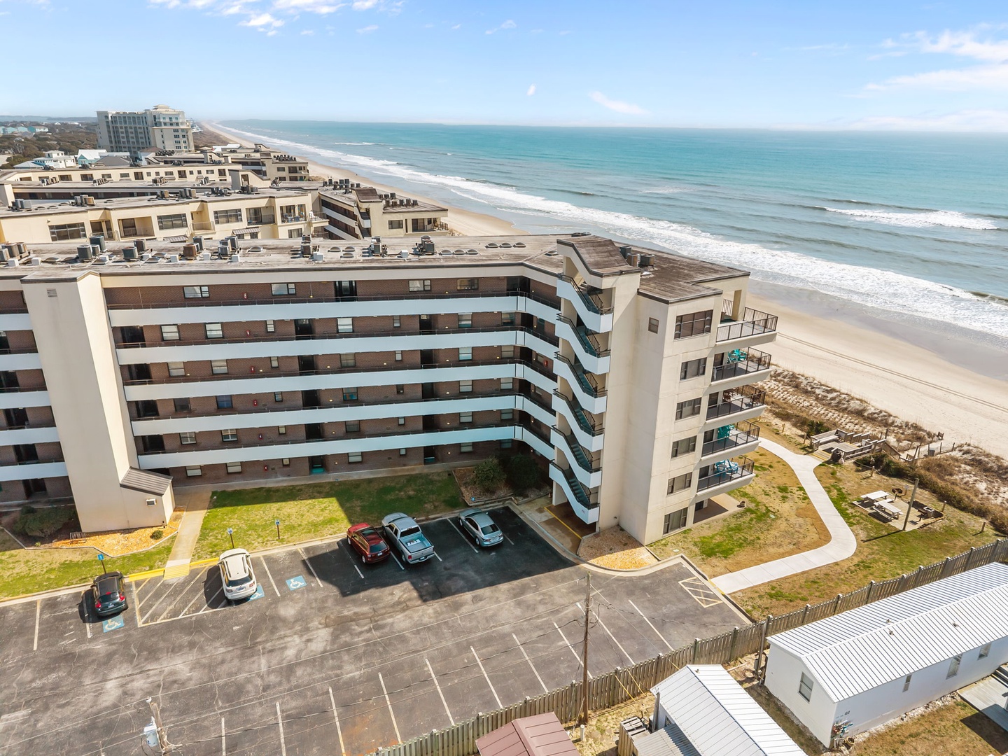 Beachfront property offering stunning ocean access with pristine sandy shores and rolling waves just steps from your door.