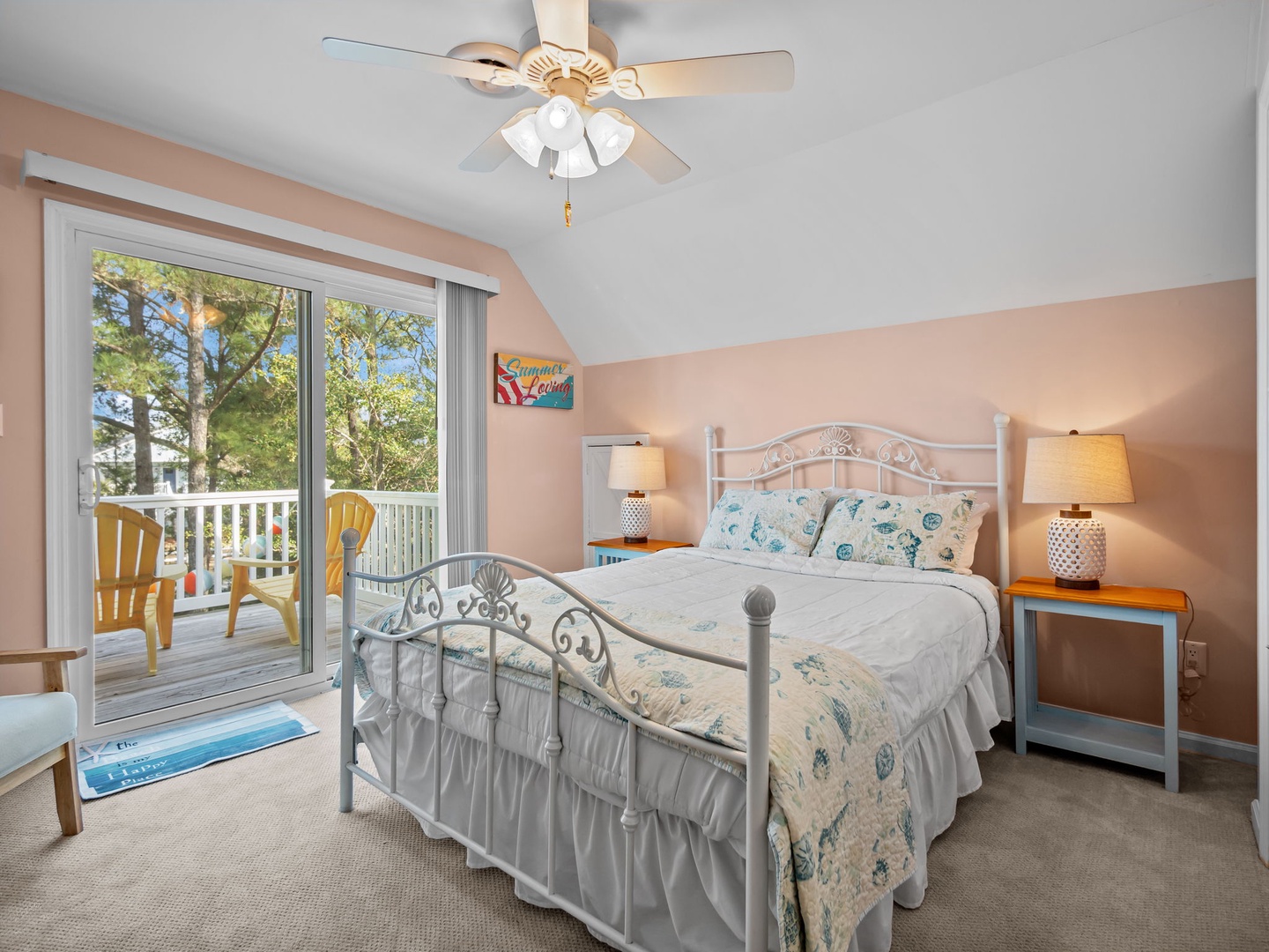 Wake refreshed in your peaceful bedroom with soft ocean-themed linens and step onto your private balcony for morning tree views.