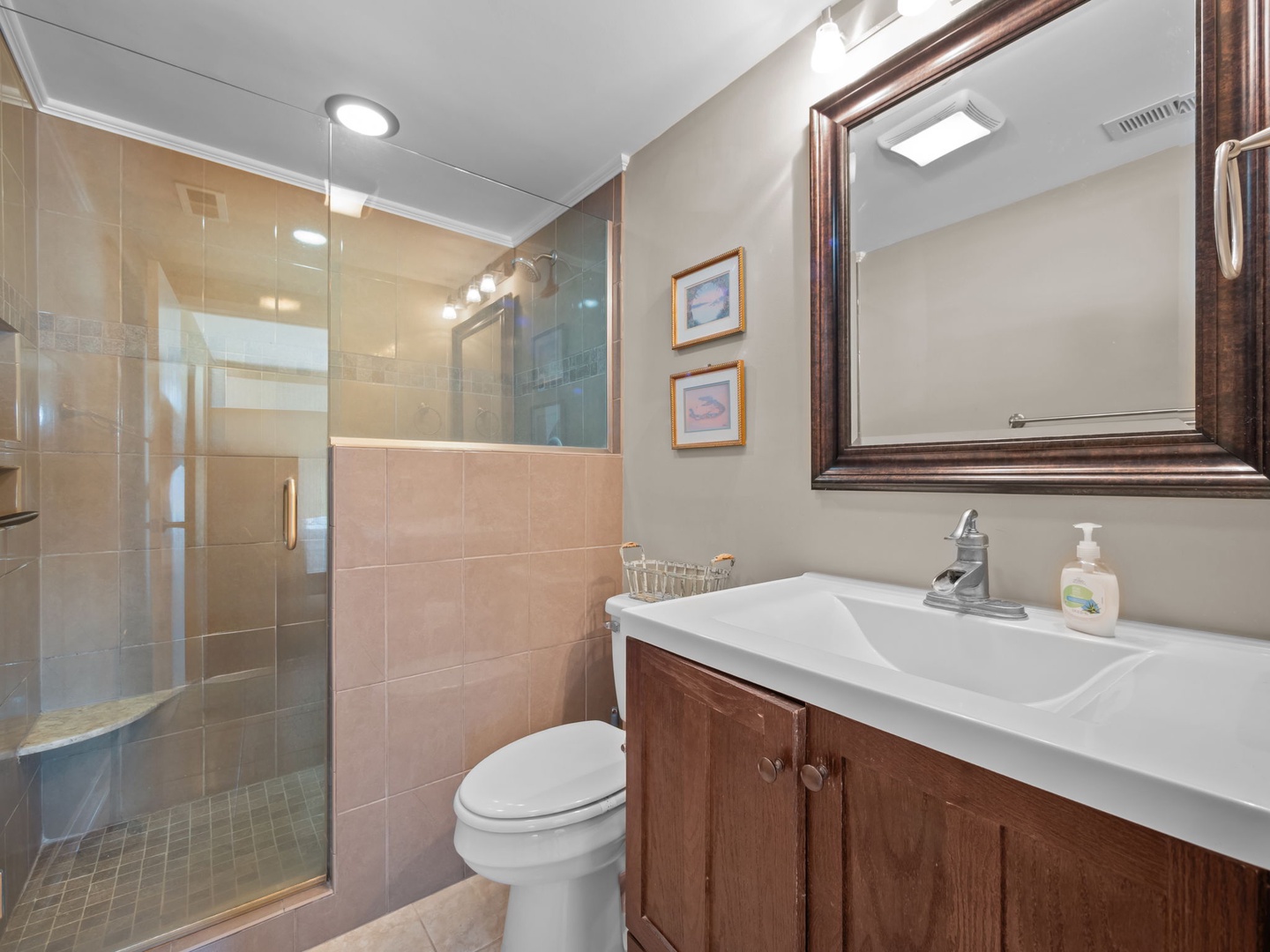 Refresh in your private bathroom with walk-in shower and elegant fixtures.