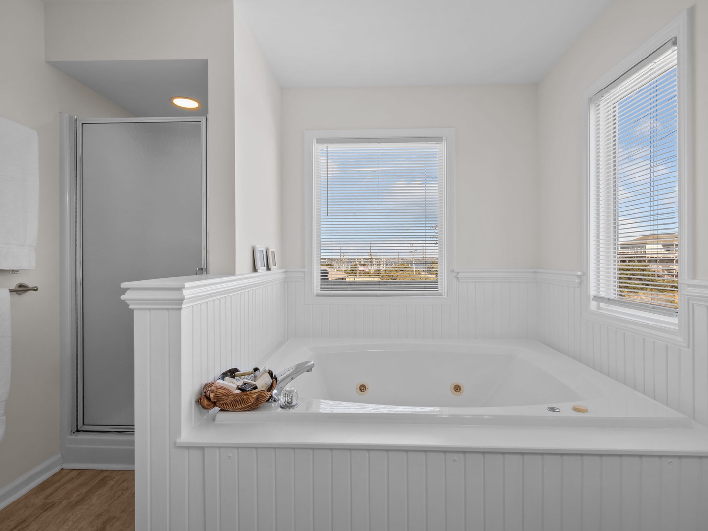 Sink into the spacious jetted tub and let warm bubbles melt your stress away while you gaze out at peaceful views.