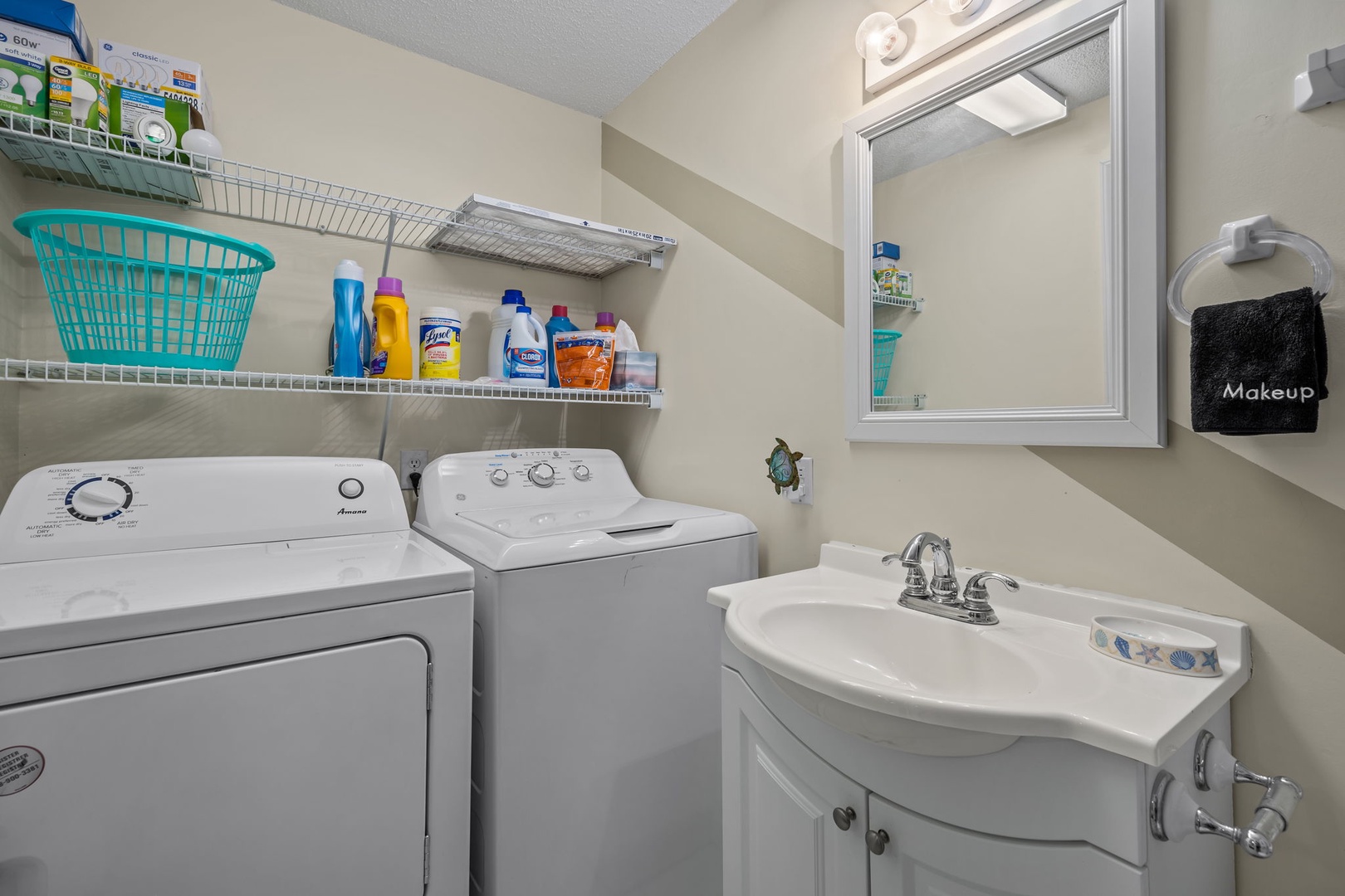 Your private laundry room keeps clothes fresh with a full washer and dryer, plus organized shelving for all your essentials.