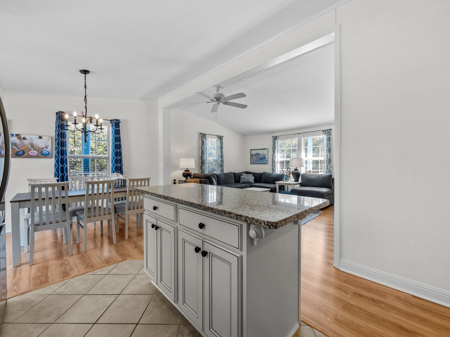 Your open-concept kitchen flows seamlessly into the dining and living areas, perfect for gathering with loved ones over home-cooked meals.