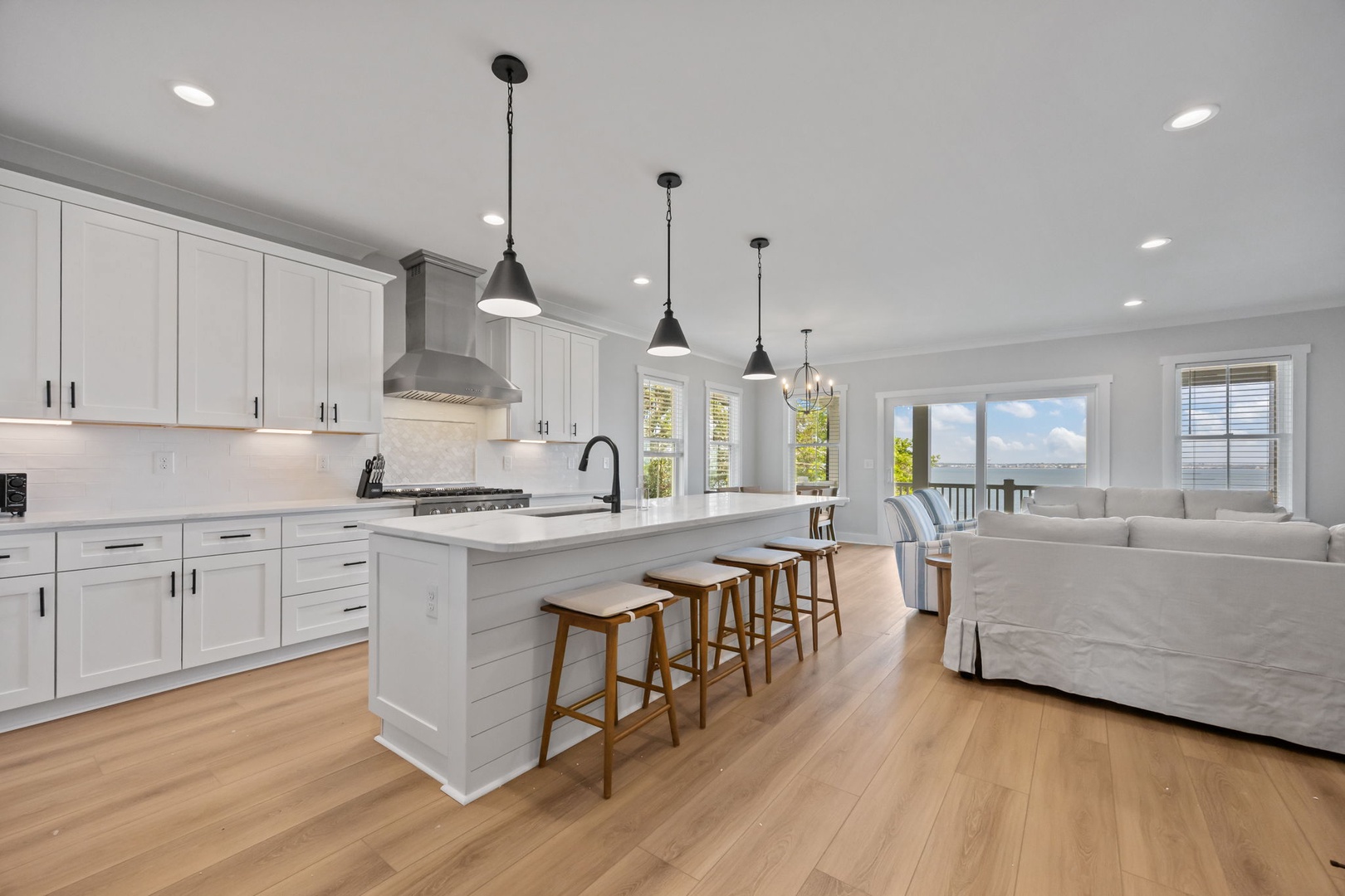 Your spacious open kitchen flows into the living area, creating the perfect space for cooking and relaxing together.