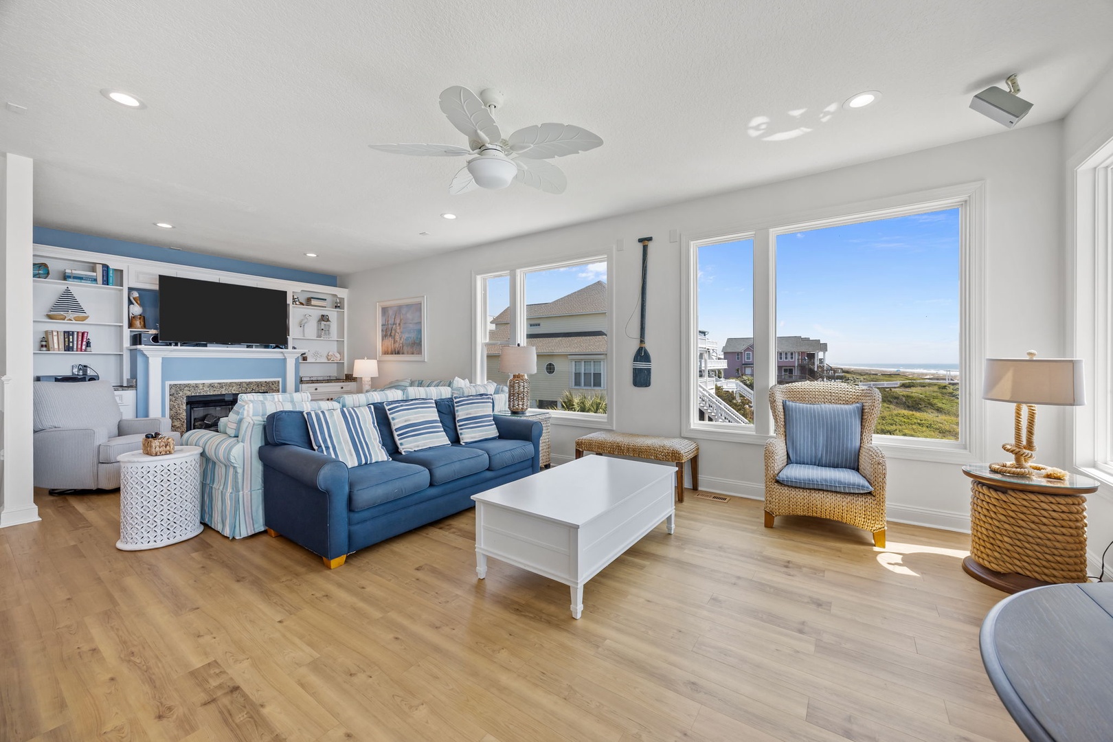 Relax in your bright coastal living room with ocean views, cozy seating, and all the comforts of home.