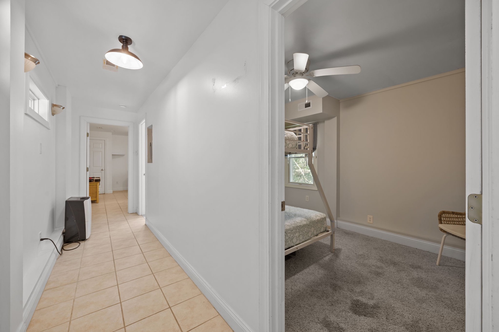 Rest peacefully in your cozy bedroom featuring a comfortable bunk bed setup, perfect for family stays or groups sharing memorable moments together.