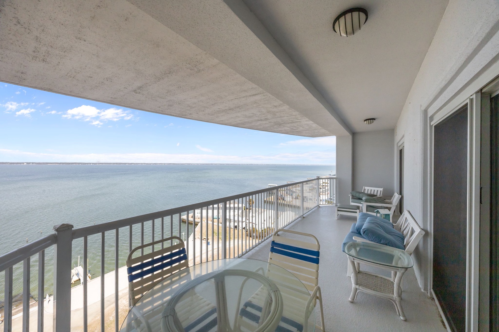 Step onto your private oceanfront balcony and breathe in the sea air while watching waves below from comfortable seating.