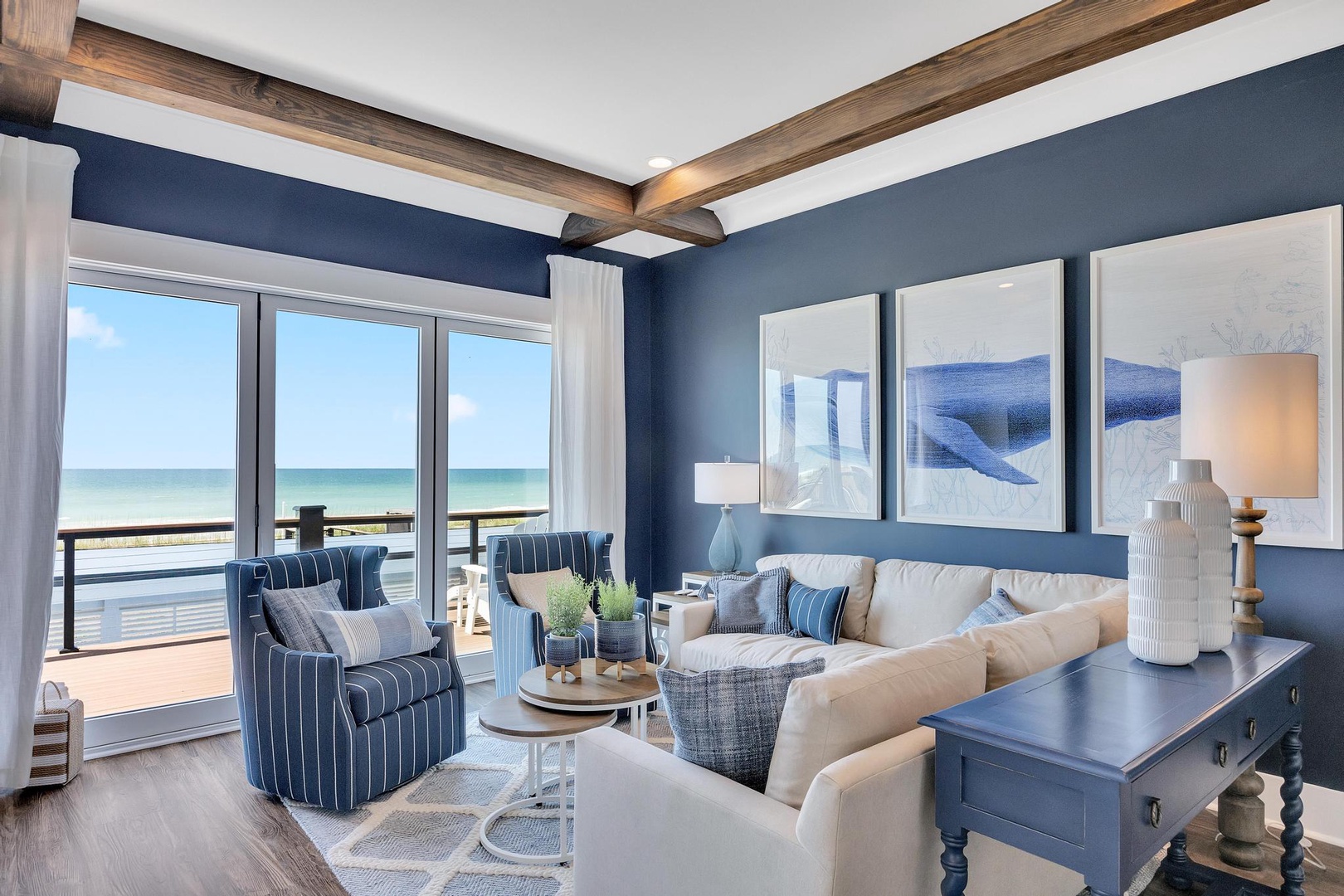 Wake up to stunning ocean vistas from this beautifully appointed living space. Sink into plush seating while natural light floods through floor-to-ceiling windows, revealing endless coastal views just beyond your private balcony.
