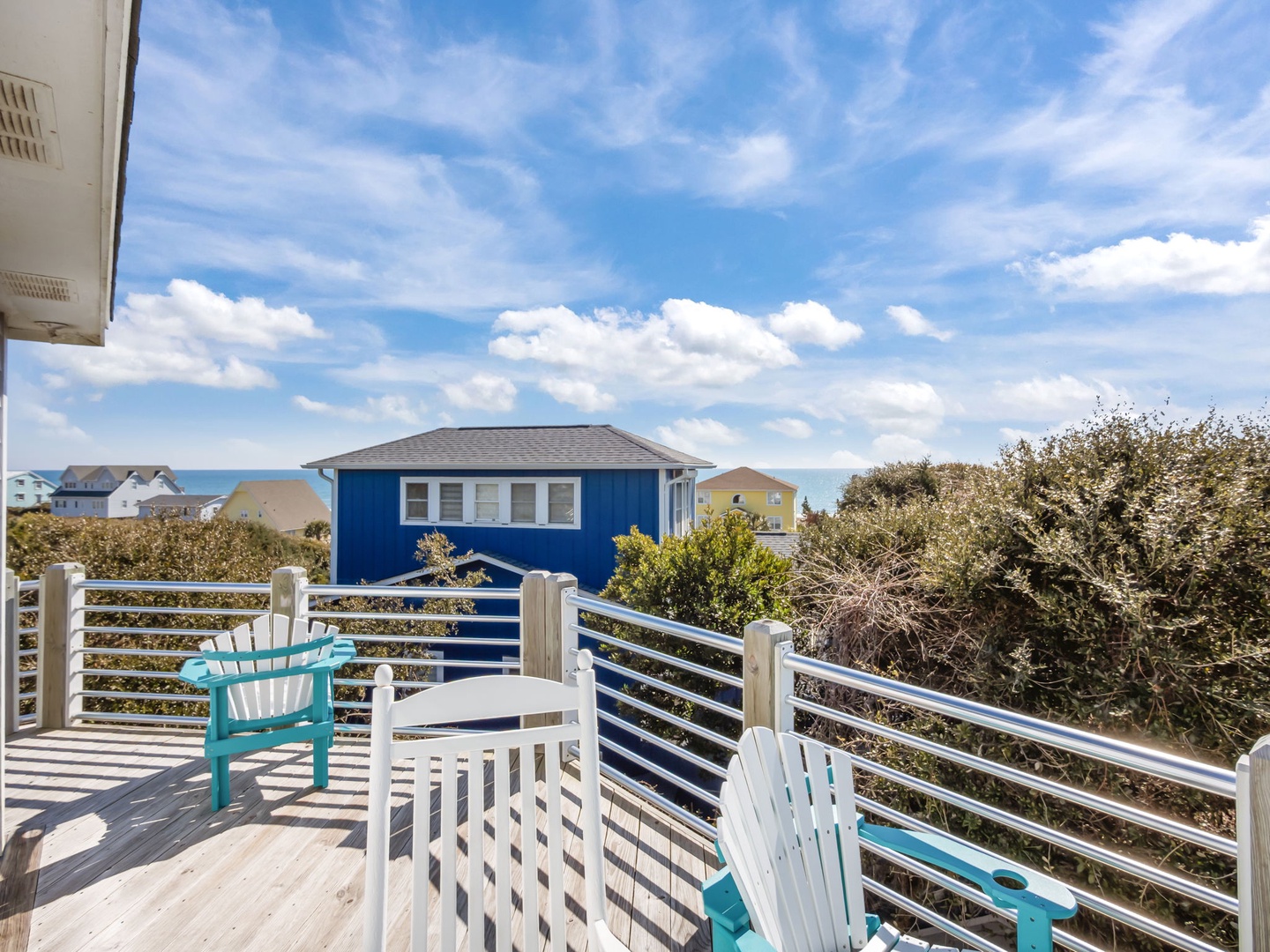 Relax in your private Adirondack chairs while soaking up ocean breezes and coastal views from this peaceful deck.
