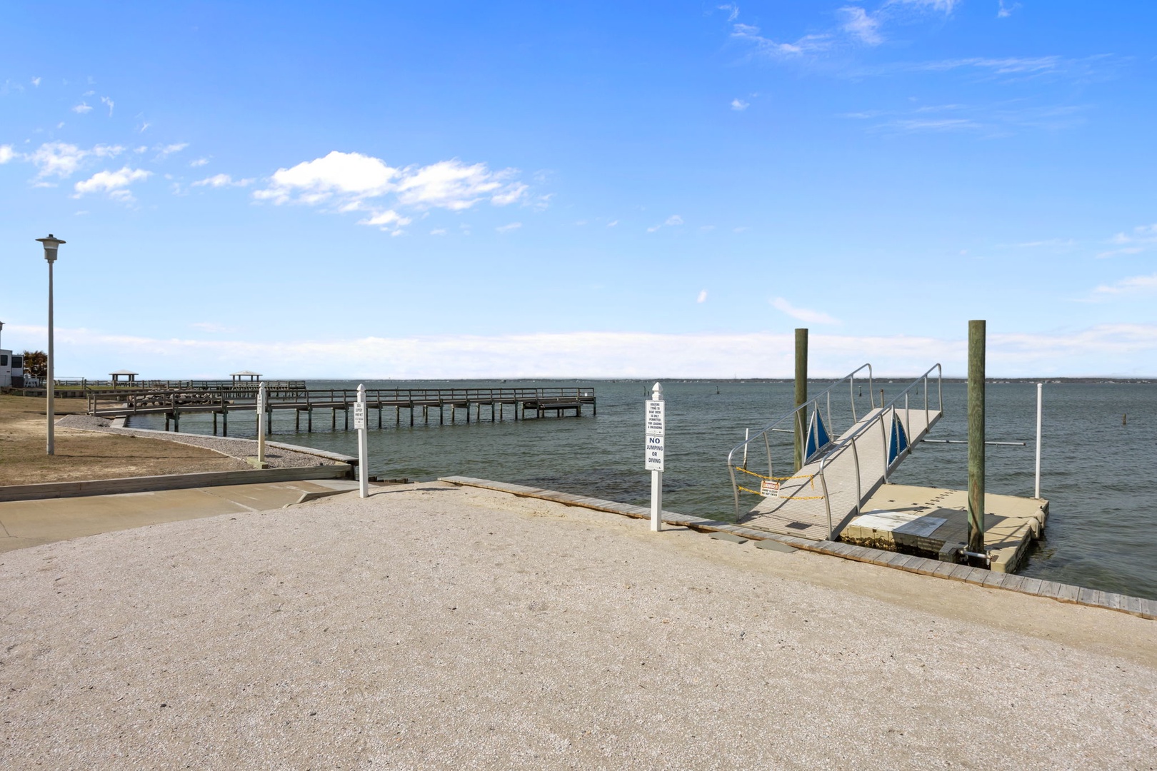 Waterfront location features easy dock access and scenic bay views for your coastal getaway.