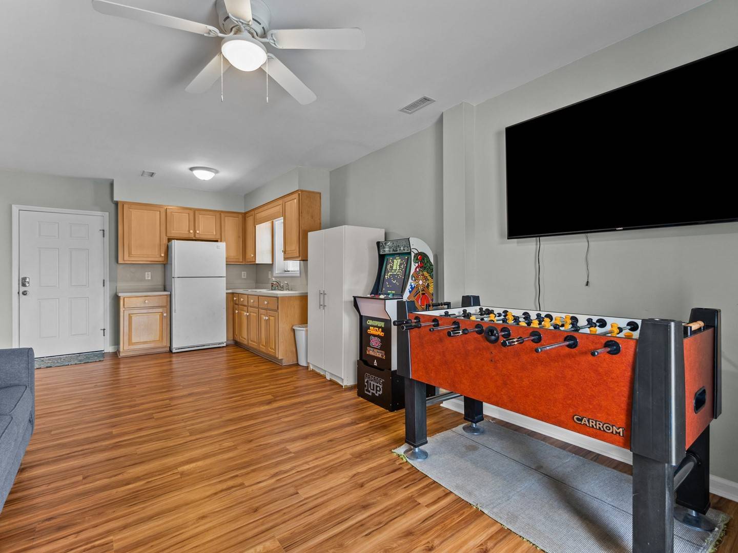 Challenge friends to foosball while you enjoy your fully equipped kitchen space with modern amenities and entertainment.