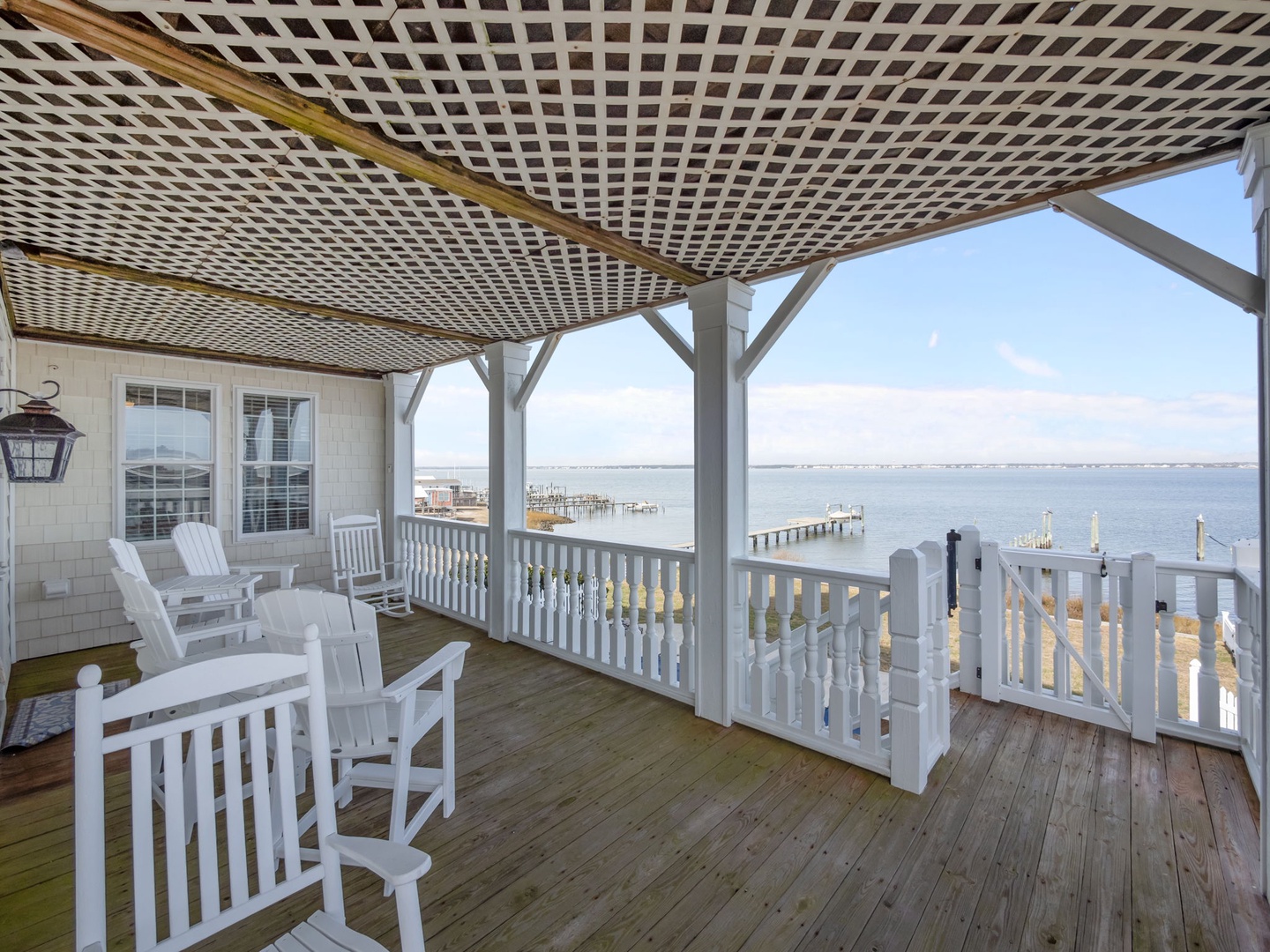 Your private waterfront deck offers stunning sea views with comfortable seating where you can relax and watch boats drift by.