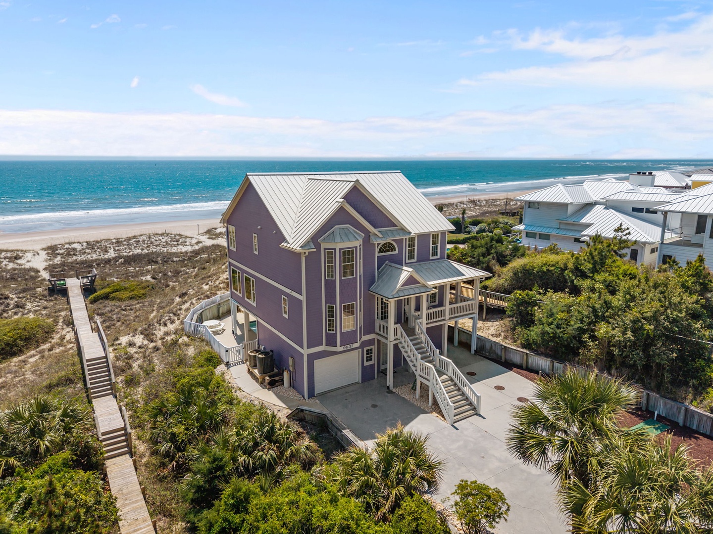Stunning beachfront property with direct beach access and panoramic ocean views in a peaceful coastal setting.