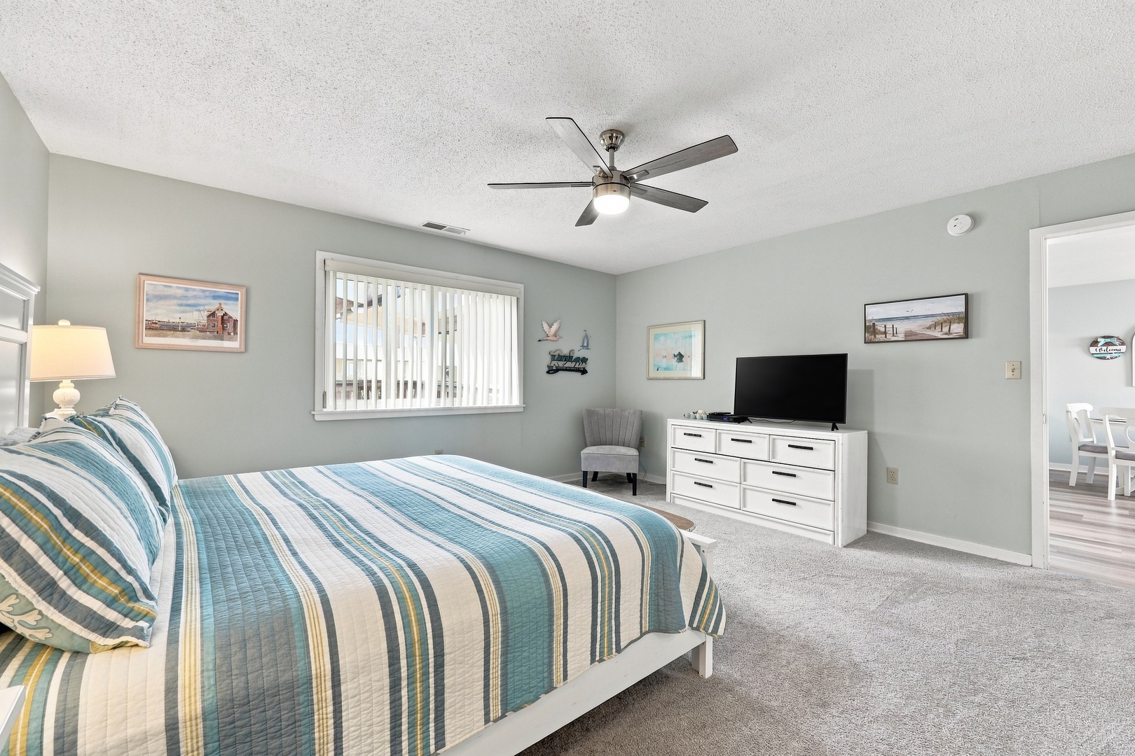Char’s Cozy Condo | King Bedroom and Television