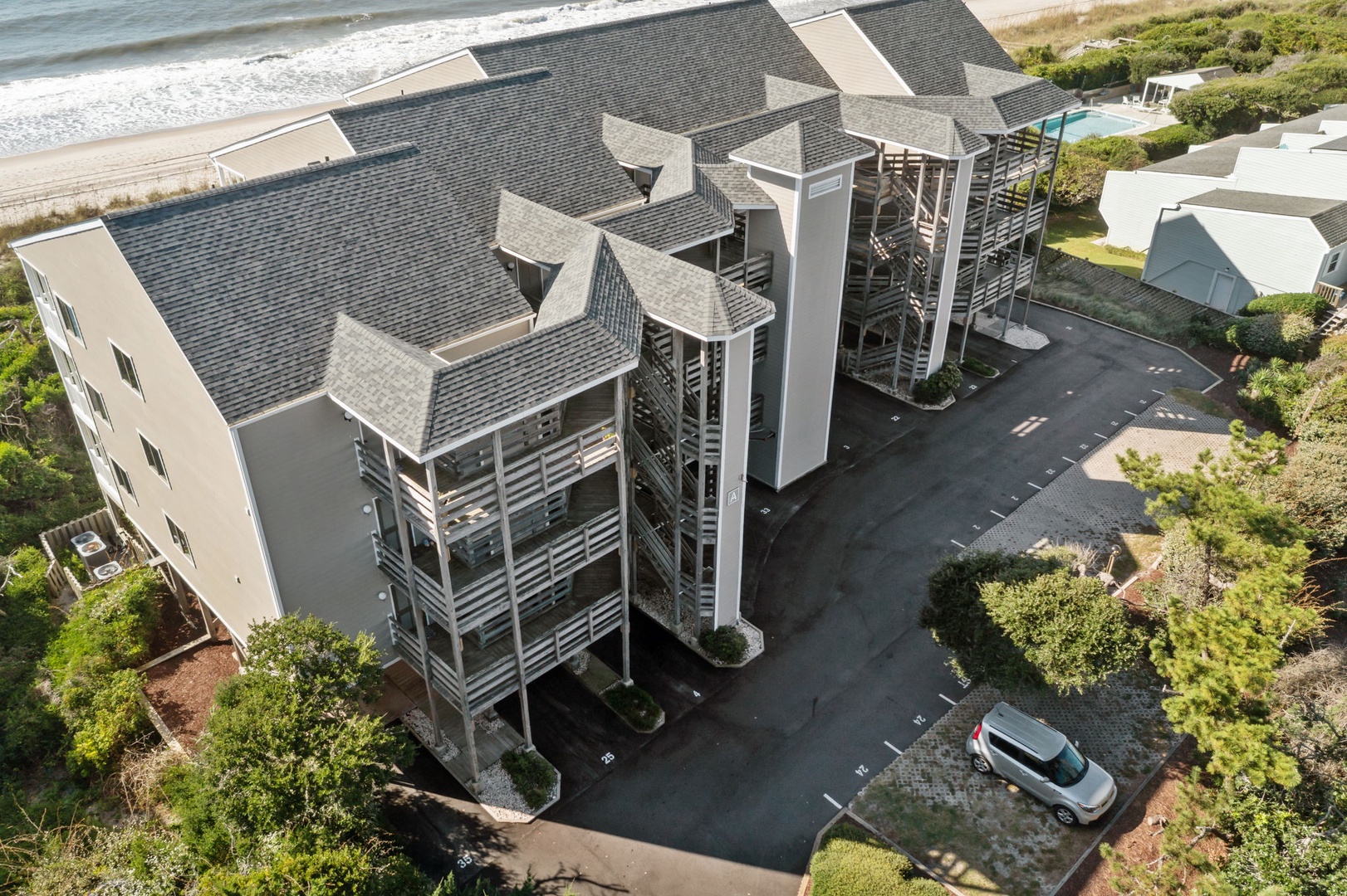 Stunning beachfront property with direct beach access and panoramic ocean views from this elevated coastal location.