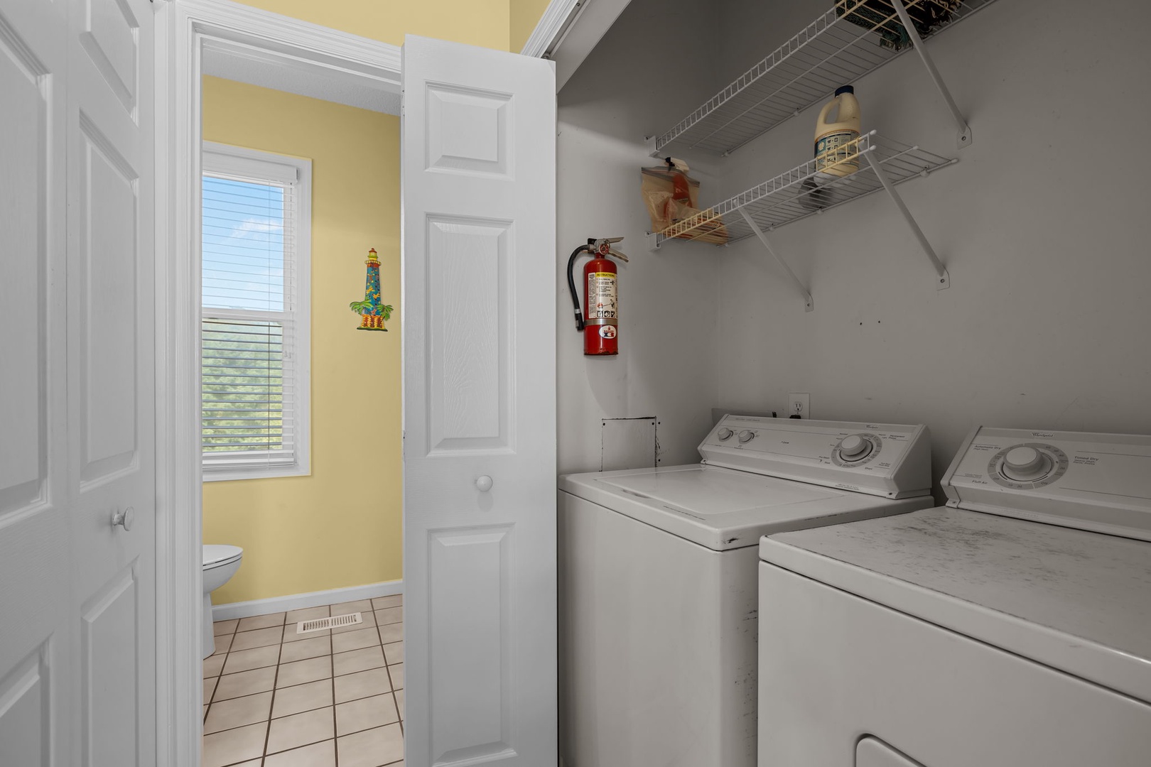 Your dedicated laundry room makes extended stays effortless, with spacious machines and organized storage shelving.
