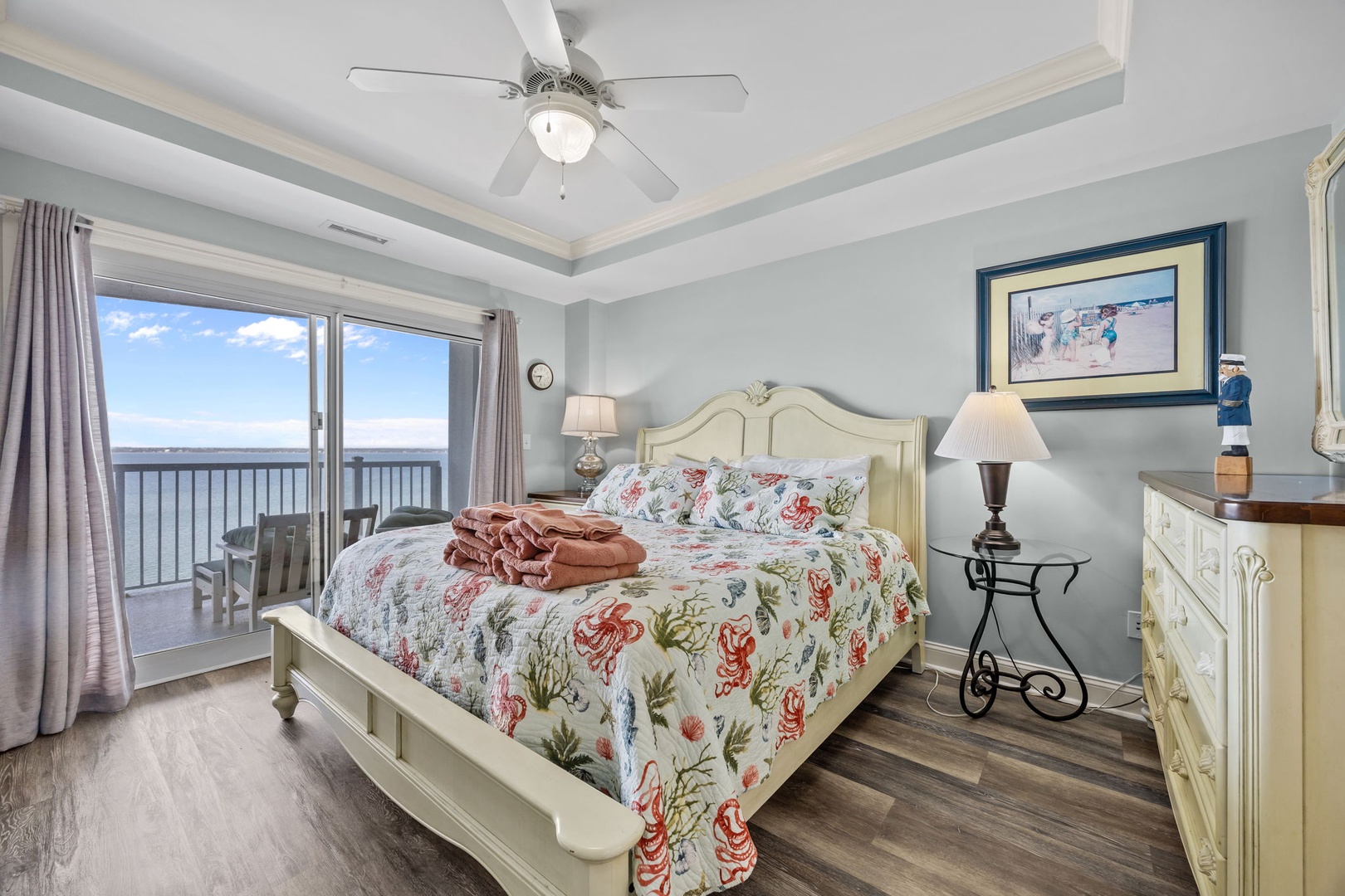 Wake up to stunning ocean views in your serene bedroom, where coastal breezes dance through and the endless horizon creates your perfect morning backdrop.