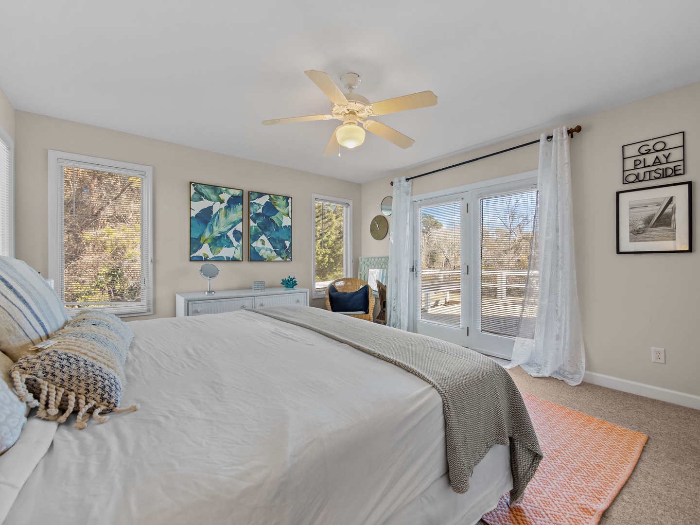 Wake up in your bright bedroom with natural light streaming through French doors leading to your private balcony.