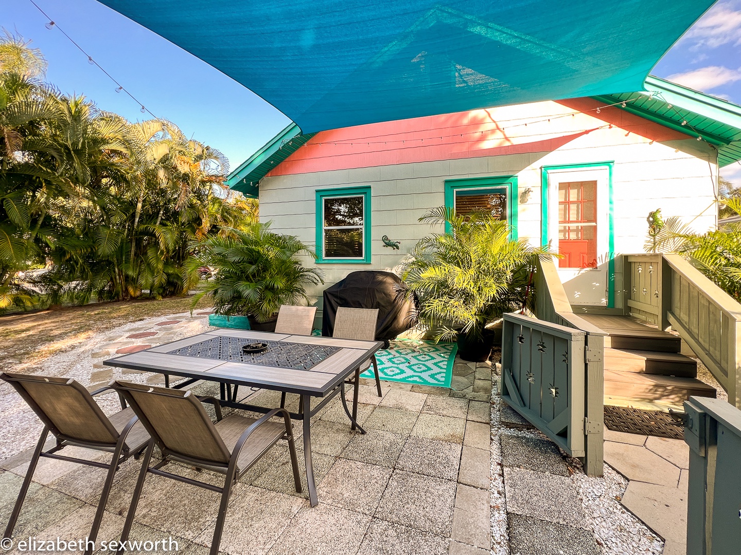 Patio area with sail shade