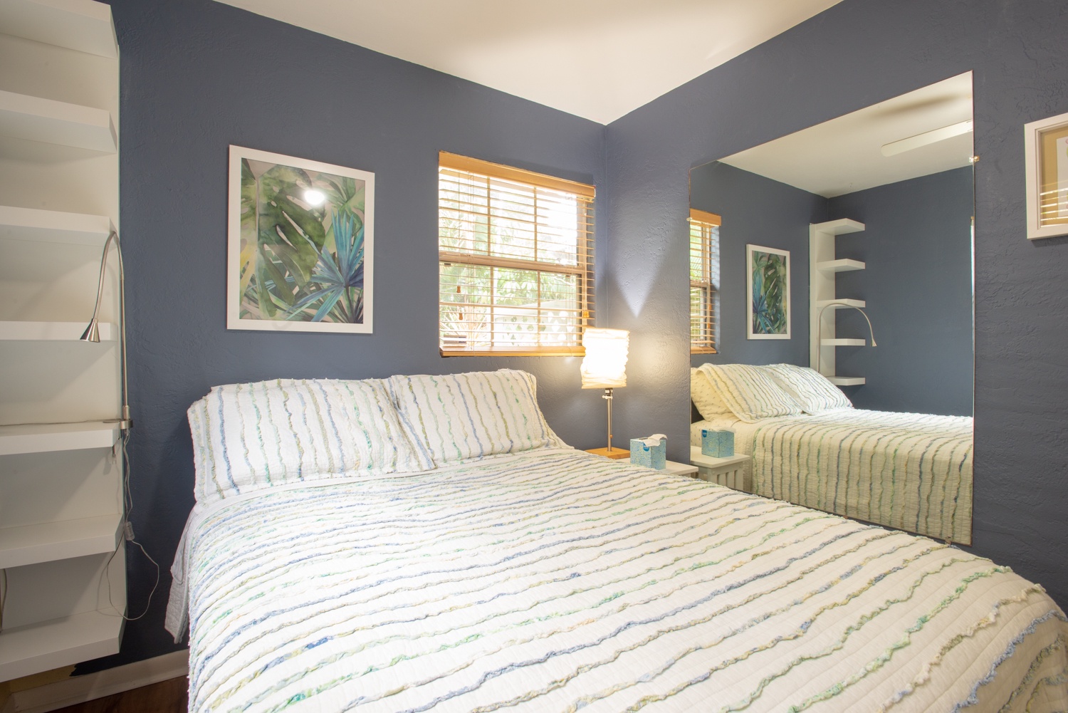Smaller bedroom has a full bed