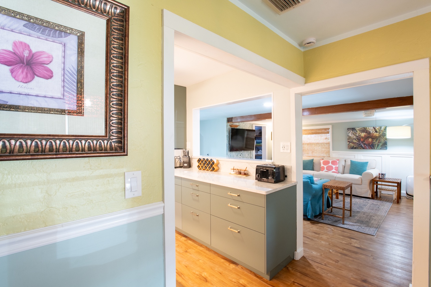 View of kitchen and living room from the dining room