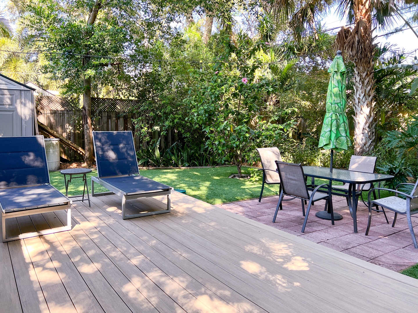 Deck and synthetic turf in the backyard
